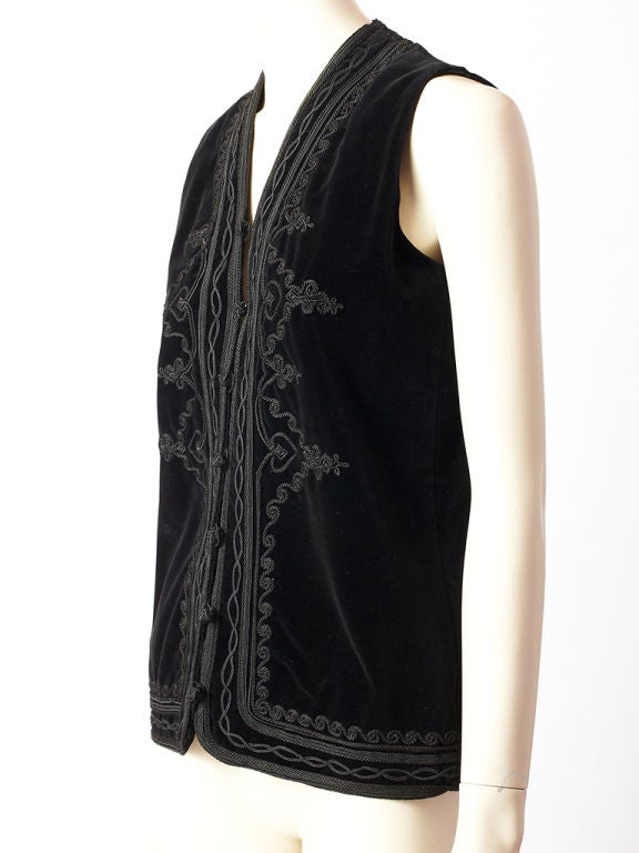 Yves St. Laurent velvet hip length vest with passementerie embellishment.