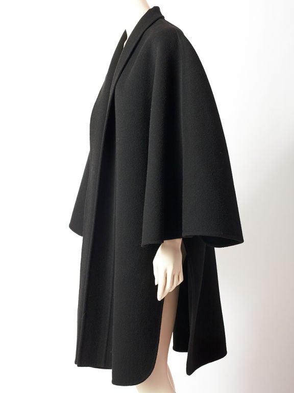 Helen Arpels wool cape with sleeve.