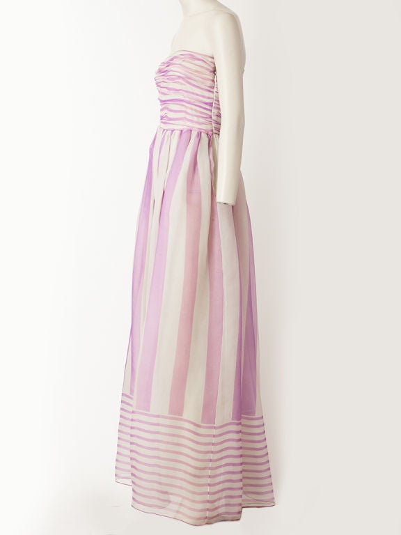 Bill Blass lavender and white stripe organza strapless summer gown. Bodice has stripes running horizontally with ruching. Body of the dress has vertical stripes and hem echos the bodices with <br />
repeat horizontal stripes. Great garden party