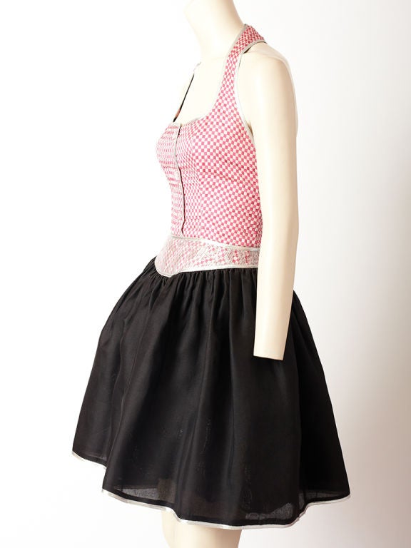 Geoffrey Beene, halter neckline cocktail dress with matching fitted jacket. Dress bodice is very fitted with halter back and neck in a pink and and white small check woven fabric. Ther is a sliver lace overlay detail at the waist. Black gazar skirt