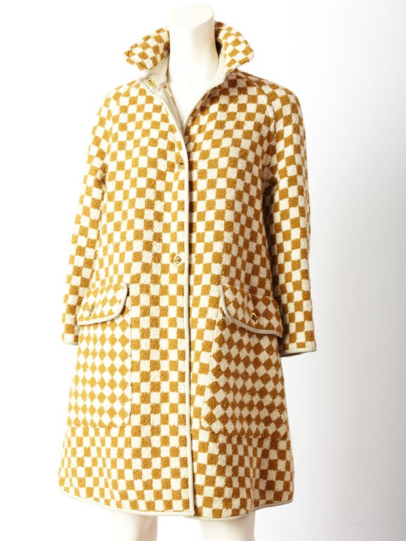 Bonnie Cashin, mustard and ivory, checkerboard squares, pattern,<br />
textured wool coat with beige leather trim, deep pockets and signature Cashin/Coach closures.