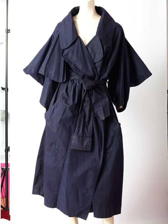 Vivienne Westwood - Malcolm Mclaren, navy blue waxed cotton, belted, mackintosh.This pieces is attributed to the 