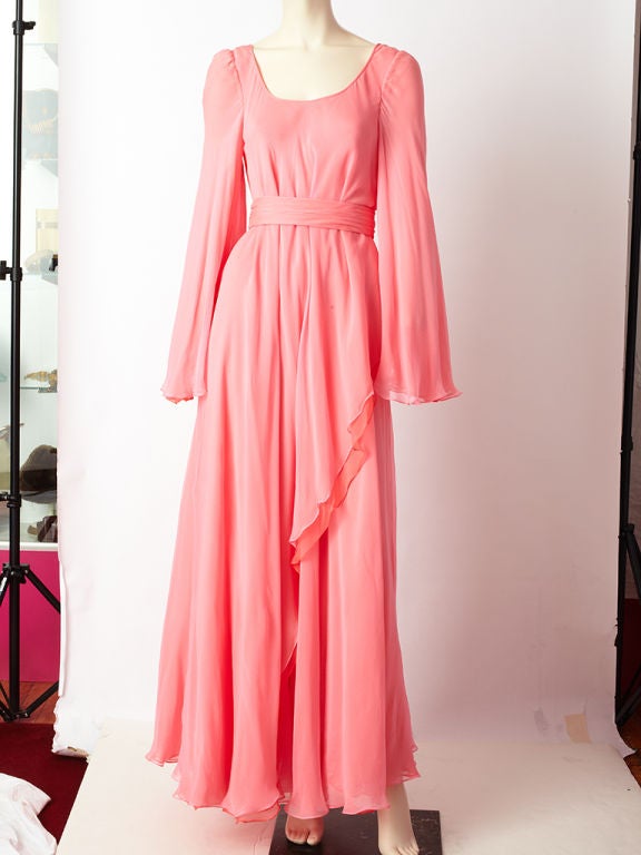 Multi-layered chiffon bell sleeve, scoop neck, tent shaped, belted gown with a bias cut 