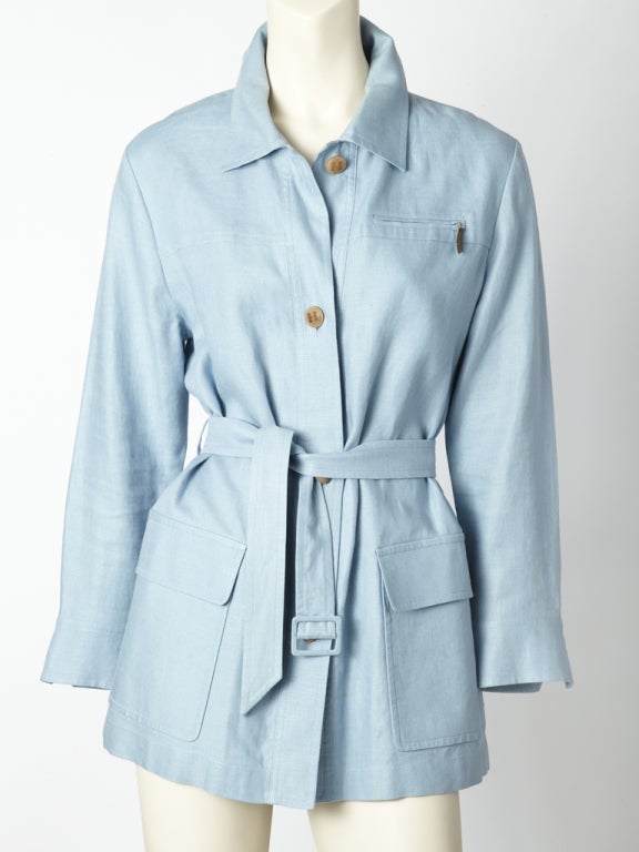 Hermes, powder blue, belted, linen safari jacket with deep side pockets and zippered breast pocket with signature Hermes leather tab.
