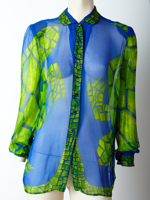 Pauline Trigere, signature turtle motif chiffon shirt in a cerulean blue and lime green print.