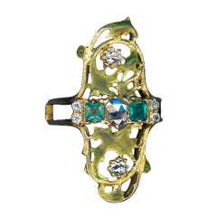 An Emerald and Diamond Ring 9