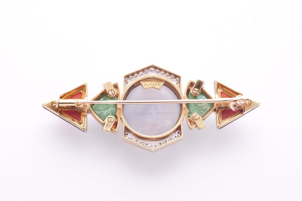 Chalcedony, cabouchon engraved emeralds, coral, black enamel and diamonds brooch by David Webb