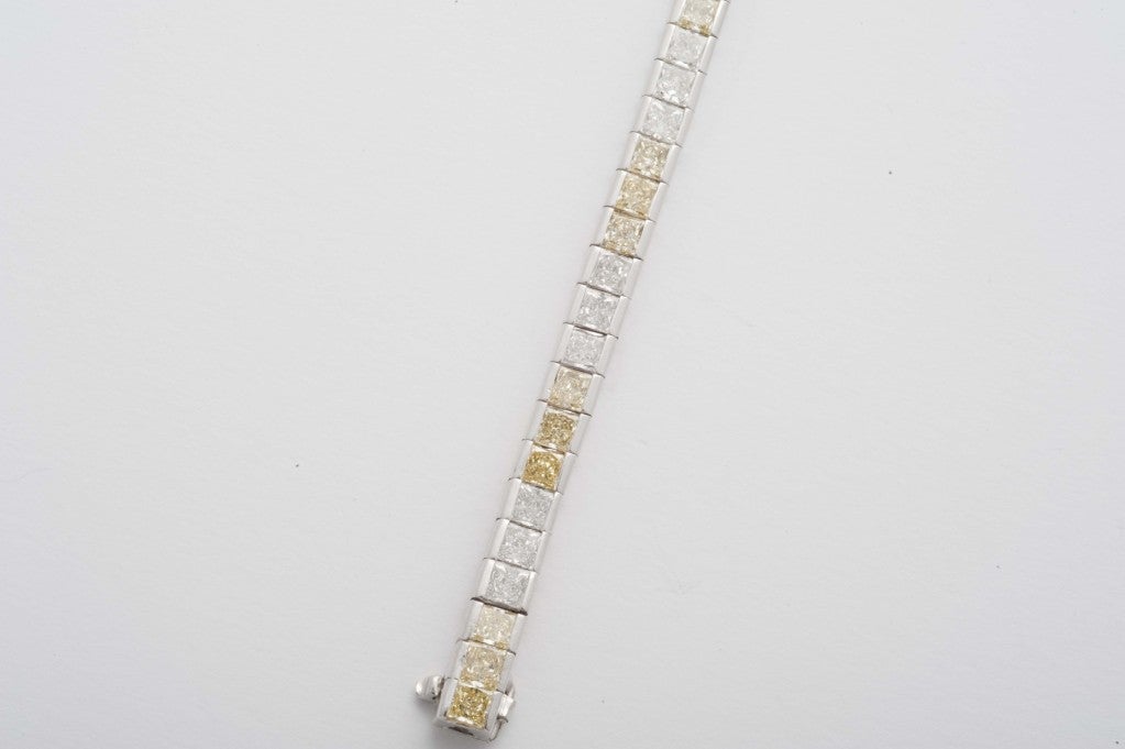 Fancy and white diamonds platinum bracelet by Bulgari