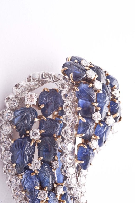 Women's David Webb gold platinum carved sapphires diamonds brooch For Sale