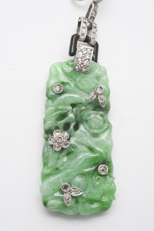 Art Deco platinum, diamonds, engraved jade and black enamel earrings