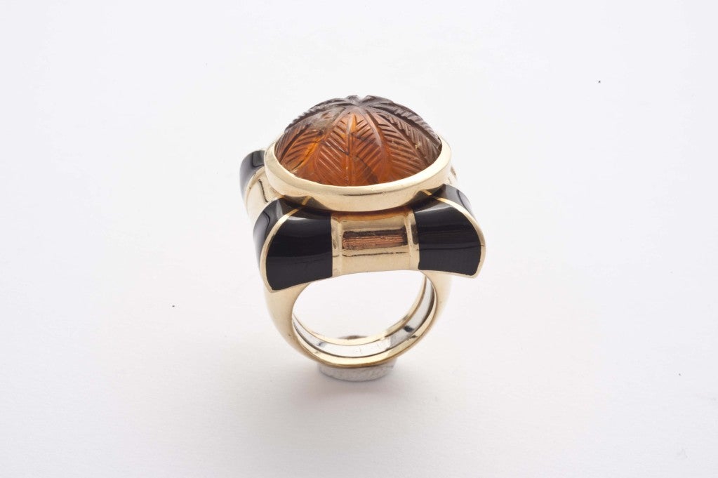 Women's David Webb gold and black enamel ring set with amber