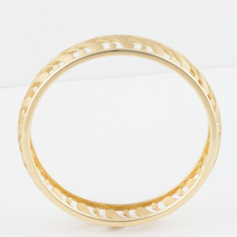 18k Gold Tiffany & Co. bangle bracelet. Designed by Paloma Picasso, made by Tiffany's.

The company's renown as an authority of taste and style, as well as the always high-end quality of its jewelry and luxury goods, make it so that people from