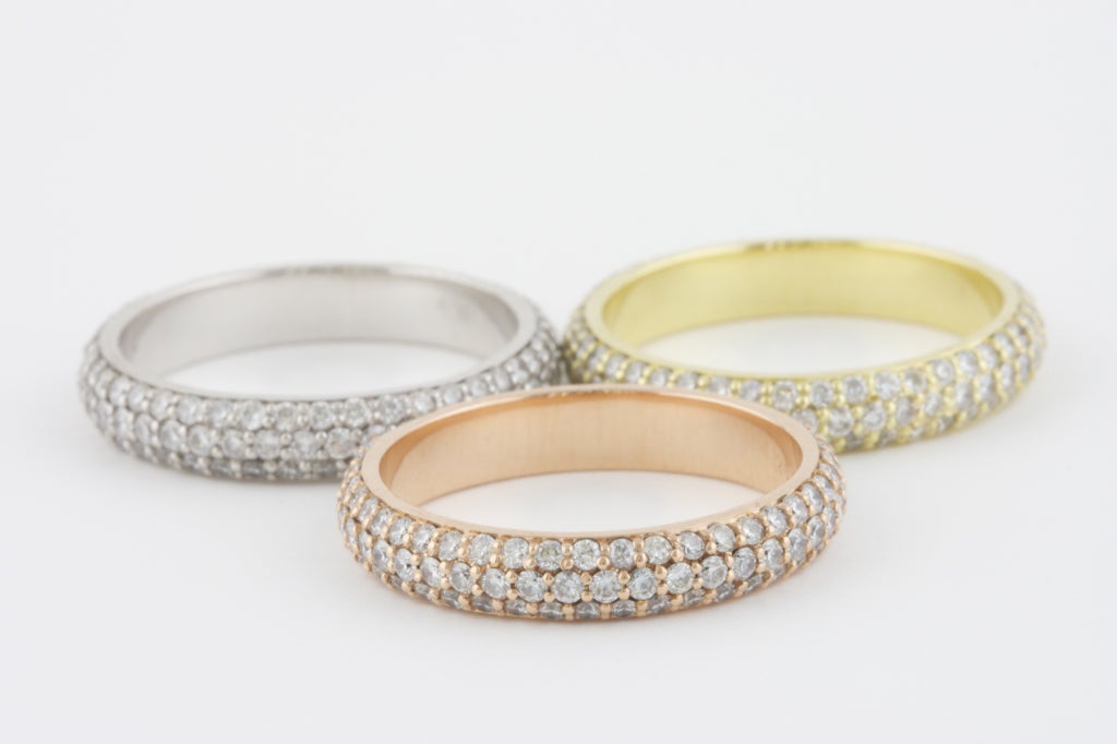 Lovely trio of 18k pink, white, and yellow gold rings set with approximately 4 carats of D-E VVS Diamonds. The stones are perfectly mounted and the rings are extremely well made.

Ring size: 6.5