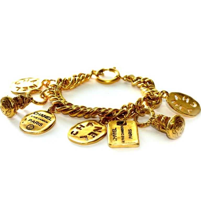 Brand: Chanel
Style: Large Charm Bracelet
Color: Gold