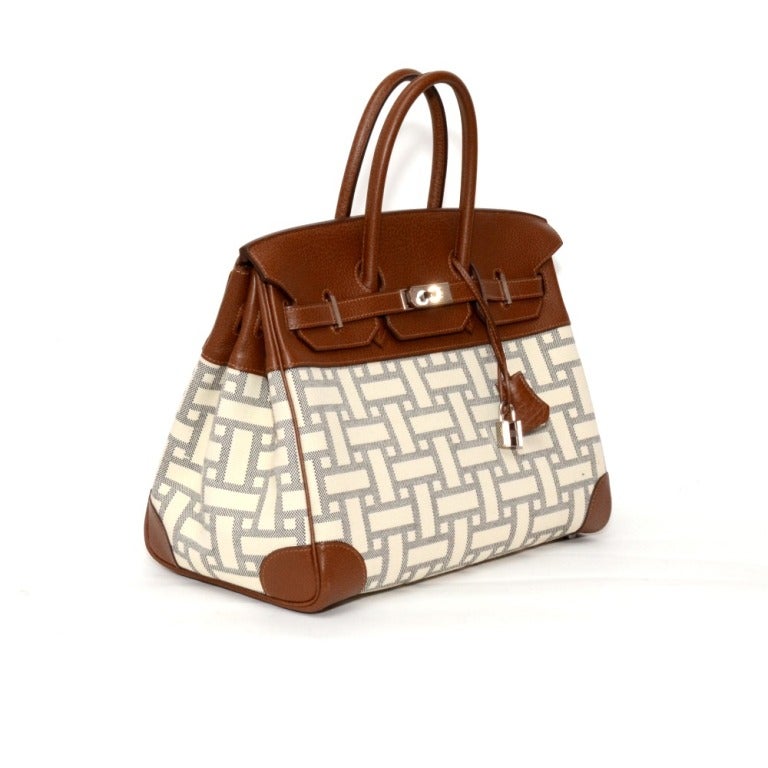 Brand: Hermes
Style: Birkin
Size: 35 cm
Color: Buffalo Leather & Mosaic Canvas
Hardware: Palladuim
Date Code: L Square