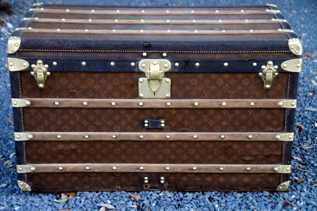 Nice Antique Louis Vuitton steamer trunk made in 1904 according to Louis Vuitton.  This was the highest end trunk with all brass hardware and leather trim.  This trunk is all original and is in nice condition. size is perfect for a coffee table. 
