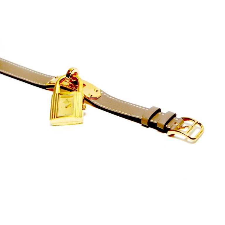 Brand: Hermes
Style: Kelly Double Wrap Watch
Hardware: Gold 
Color: Gray