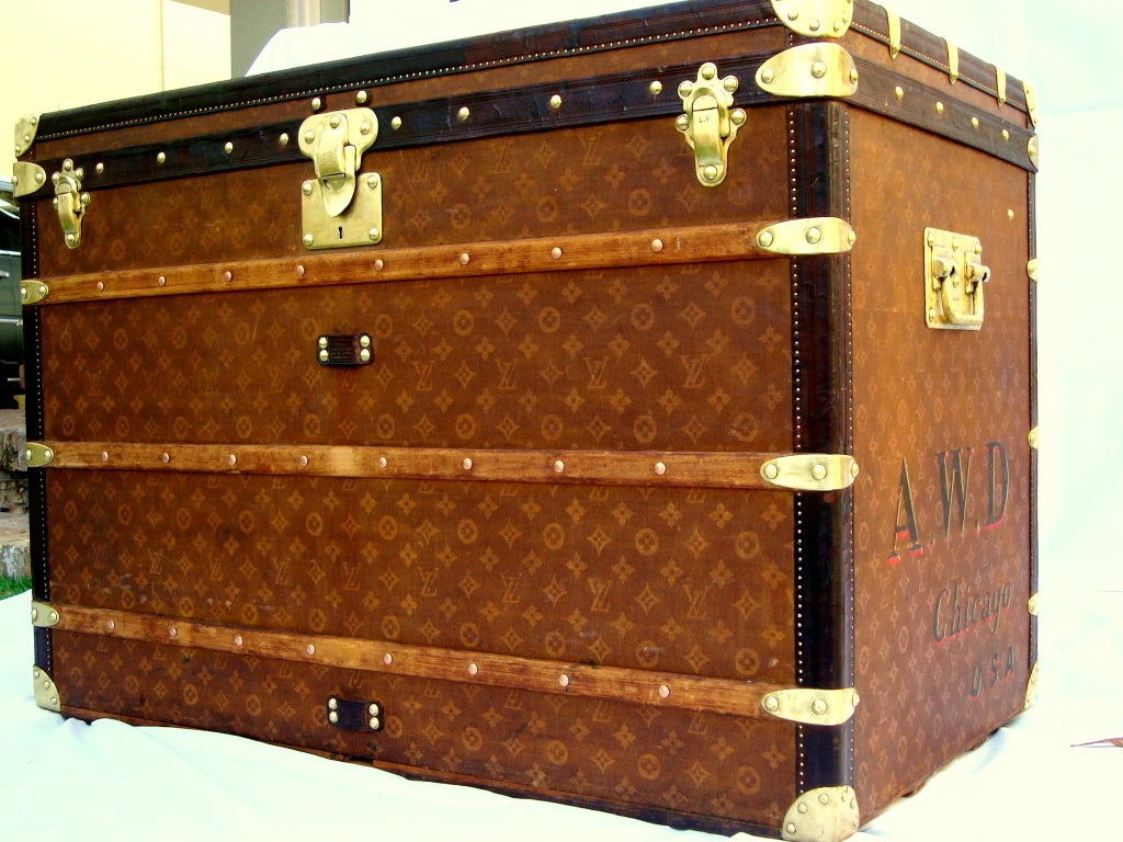 enormous louis vuitton haute(high) trunk in incredible condition.  serial number dates it to around 1902.  This trunk is the highest grade available with real leather trim, all LV signed Locks, latches, and brass hardware including solid brass LV