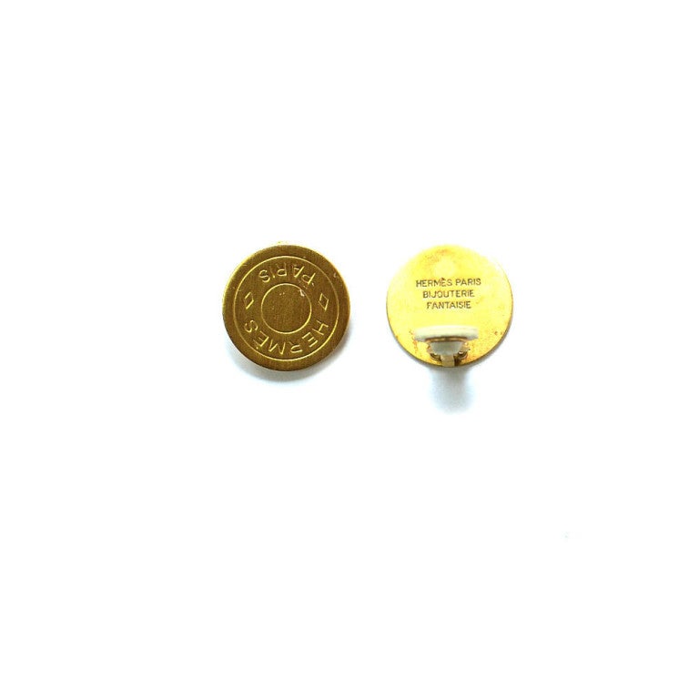 Contemporary Hermes Gold Tone Button Earrings For Sale