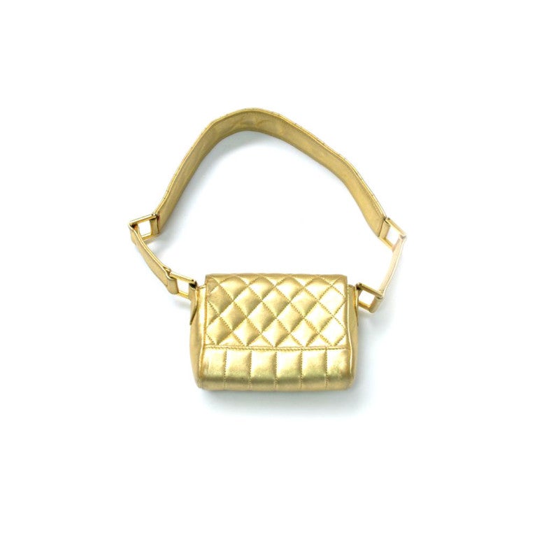 Authentic Mini Gold Chanel Handbag
Leather : Lambskin