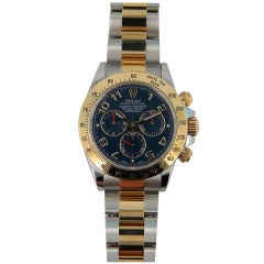 Rolex Stainless Steel and Yellow Gold Daytona Wristwatch Ref 116523