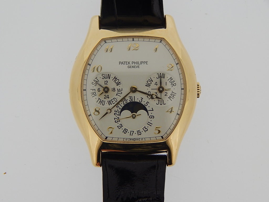 Patek Philippe Yellow Gold Tonneau Perpetual Calendar Wristwatch Ref 5040J