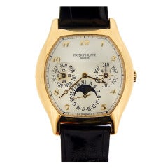 Patek Philippe Yellow Gold Tonneau Perpetual Calendar Wristwatch Ref 5040J