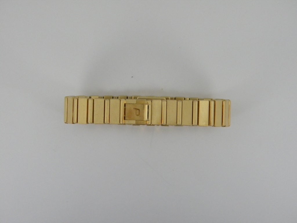 Piaget ladies 18k yellow gold Polo Mini wristwatch, quartz movement, 18mm x 14mm. Champagne dial. Six months full full warranty.