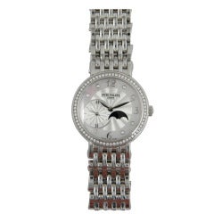 Patek Philippe Lady's White Gold and Diamond Moonphase Wristwatch Ref 4958