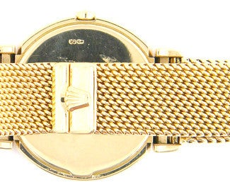 Rolex 18k yellow gold lady's Cellini wristwatch, quartz movement, 33mm, Ref. 6622 with mesh bracelet, white baton dial, sapphire crystal. Will fit 73/4