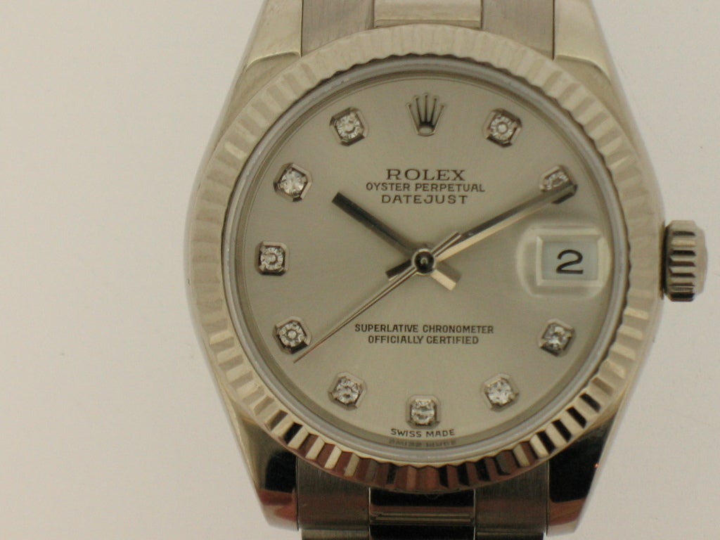 Rolex 18k white gold mid-size Day-Date President, automatic movement, size 31mm. Rolex Ref. 178279, 18k white gold case and bracelet, sapphire crystal, silvered diamond dial, Box and papers. Y series, circa 2002. One year full warranty.