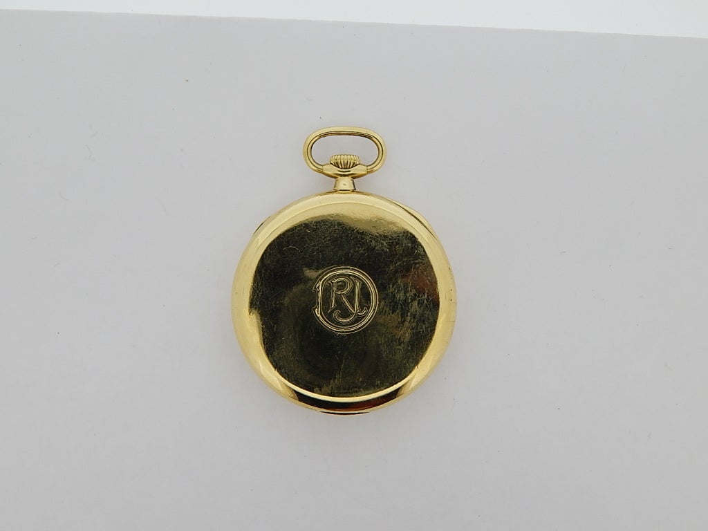 Patek Philippe 18k yellow gold open face pocket watch, circa 1920s, silvered dial with applied stylized numerals. Triple signed by Patek and also signed by the retailer, Grogan Co. of Pittsburgh, PA, USA. Movement is 18 jewel and 8 adjustments with