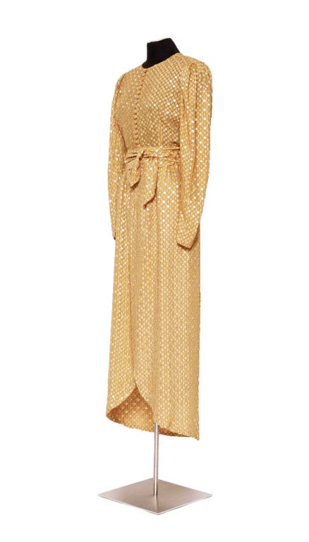 Numbered Lanvin 80's gold silk dress...the fabric is a mix of silk, polyester & metal. French size label 42
Measurements taken flat:
Ua to Ua 19inch/48cm
Waist  14inch/36cm
The dress capture the light really well, but please do look at the