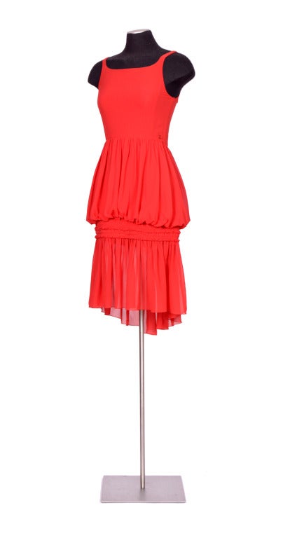 Gorgeous dress by Chanel made in scarlet red silk chiffon.
No size label please go by measurements taken flat.
UA to UA 13inch/33cm - Waist 16inch/41cm - Hips 18inch/46cm
In excellent condition.