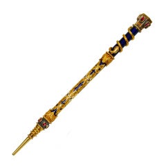 A Fine Gold and Enamel Pencil with A Gold Snake and Ruby Set
