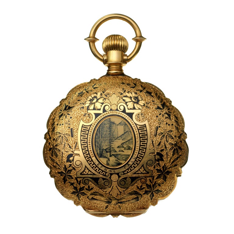 Waltham scalloped-edge hunting case pocket watch with black enamel scene.