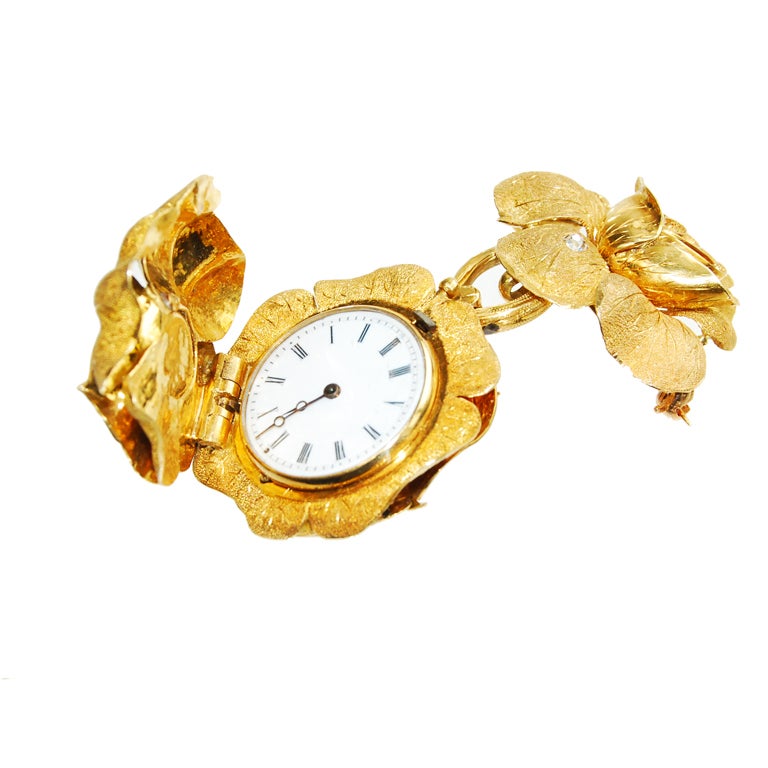 18k pendant watch in shape of a rose with matching brooch, made for the Chinese market.