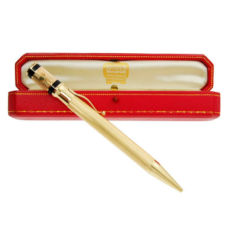 Gold Propelling Pencil with A Cylindrical Shape by Cartier. For Sale