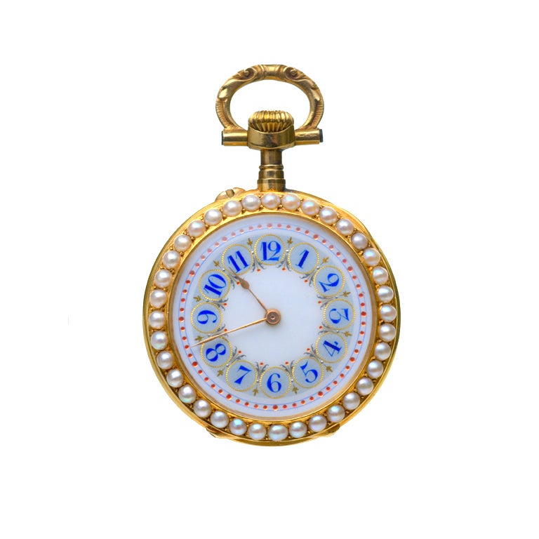 18k yellow gold fob watch with hardstone cameo on reverse, pearl-set border, with Swiss cylinder movement.