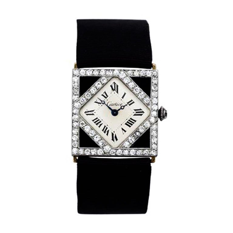Cartier Lady's Platinum, Diamond and Onyx Wristwatch For Sale