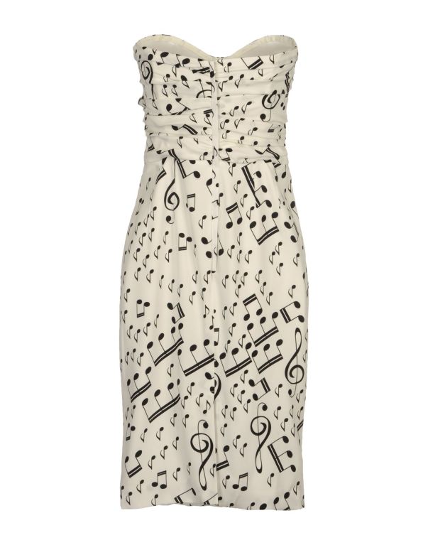Dolce & Gabbana Kim Kardashian favorite Music Note Print Strapless Dress.Size 42 It.Made in Italy.
Elegant draping detail throughout. Light boning in bodice. Zipper at back. Fully lined.Composition: 94% Silk, 6% Elastane
Details: wide neckline,