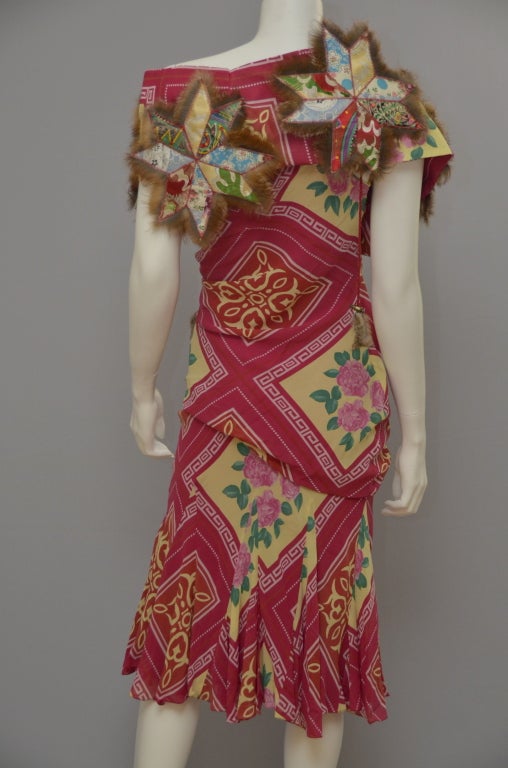 John Galliano Runway  Silk Chiffon Dress.
Condition Excellent - New.
Size 4 US.Fabric: 100% silk with  fur coyote  trim.Rabit pompon.
Measurements:Waist:15