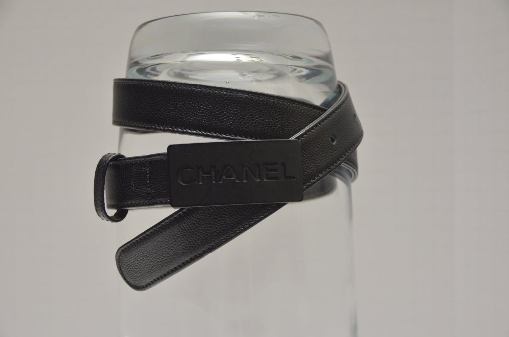 Chanel leather belt.New with black Chanel box.Made in Italy.
marked 75/30.Lenght: buckel to first hole 29
