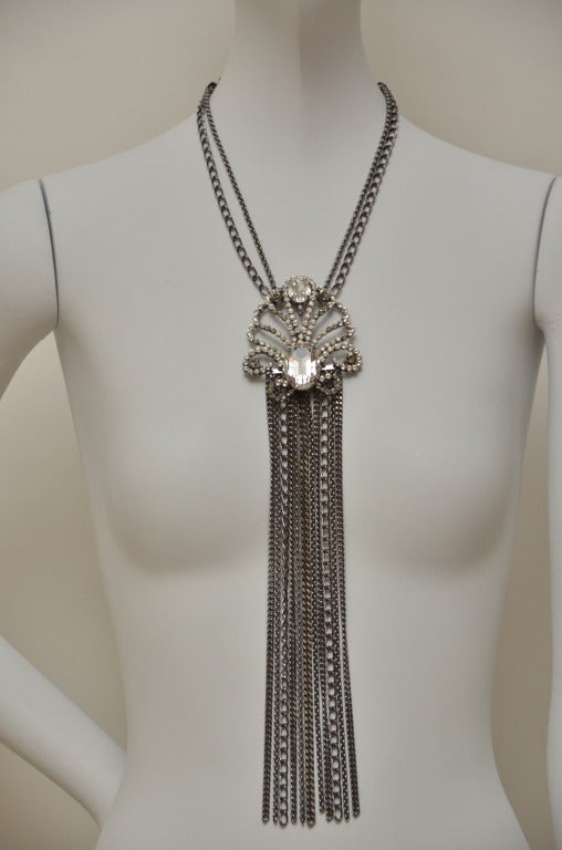 You'll light up any party with this fabulous crystal necklace from Gianfranco Ferre.Genuine Swarovski crystals necklce will perk up an elegant black dress or even a casual jacket. Specifications:
Gianfranco Ferre multi-strand choker