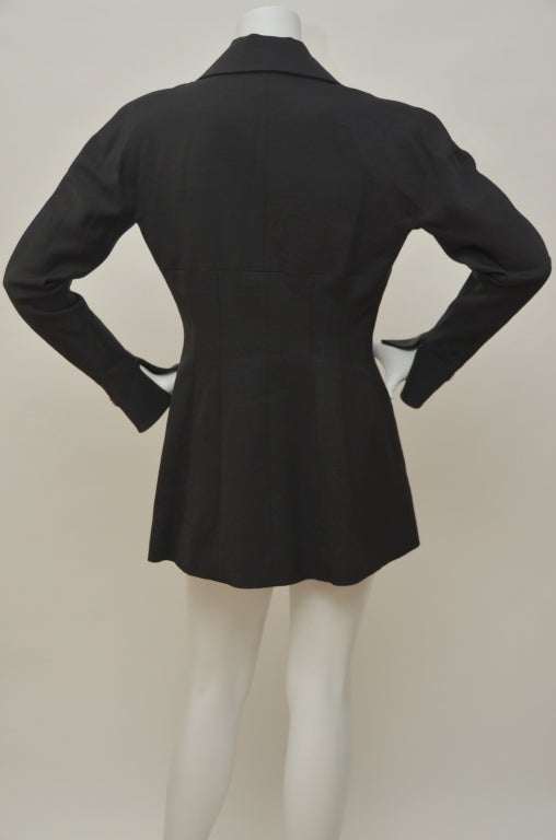 Karl Lagerfeld blazer/jacket with embroidery on the front and sleeves.Excellent vintage  condition.Made in France.Size 40 Fr.
Fabric contents:56% Acetate,44% Laine.
Final sale.