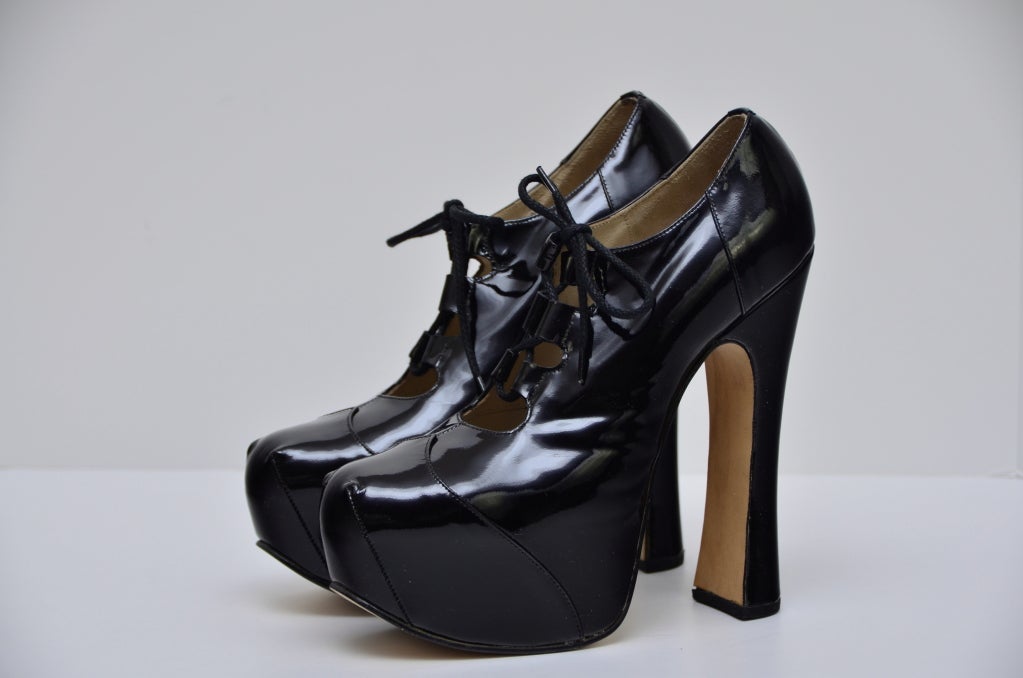 Fashion or surrealism? Super Elevated Court Black Patent Leather 