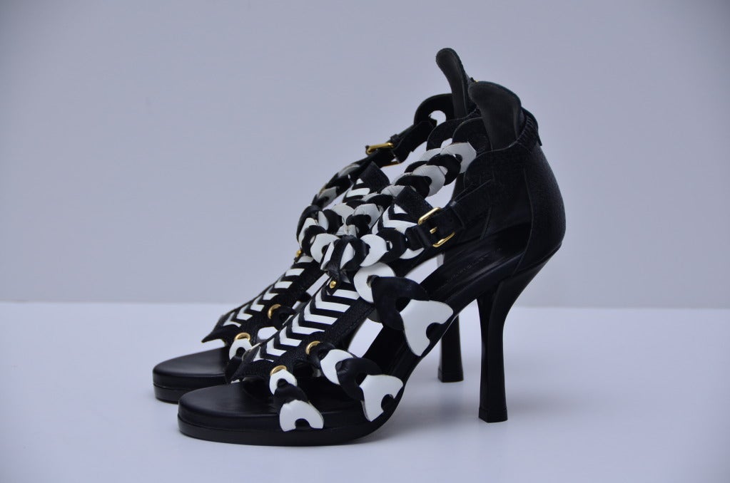 Balenciaga Black/White Gladiator Shoes New.
Size 37 IT.Made in Italy.No box.
Retail price was over $2,500.

Final sale.