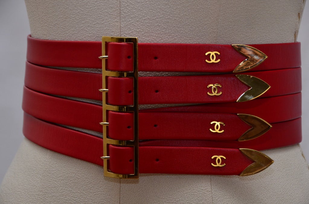 Rare Red Chanel corset belt from '90.Size 75/30.Excellent condition,new.Four buckles in the front with gold hardware and 4 gold tone CC on each buckle.Made in France.
Belt measure:Total Lenght :33