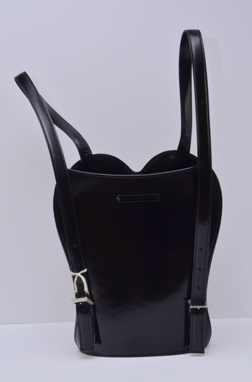 1998 Jean Paul Gaultier iconic bustier backpack purse. Black hardshell leather with fabric lined interior.Comes with riginal dustbag.New, Excellent condition. 
Body measures:height 13