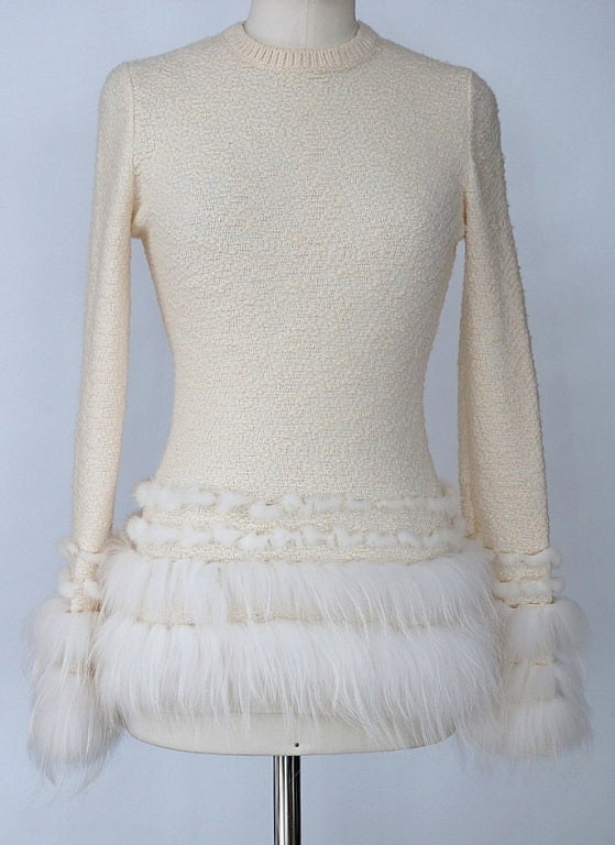 Alexander McQueen richly textured Wool and Cashmere sweater top in soft cream.
Hem and cuffs are edged in lush white Mink fur - the combination is sublime.
New with tags attached - but you may want to dry clean upon receipt. 
Retailed over